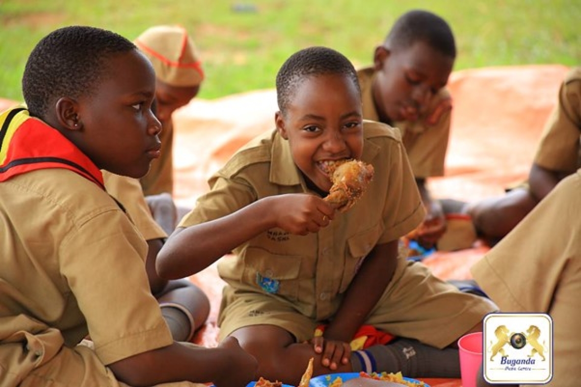 Children happily enjoying a meal together Children happily enjoying a meal together